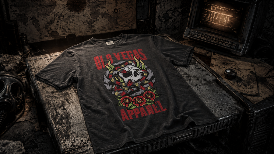 OLD VEGAS post-apocalyptic graphic tee displayed as a recovered artifact on a dystopian workbench