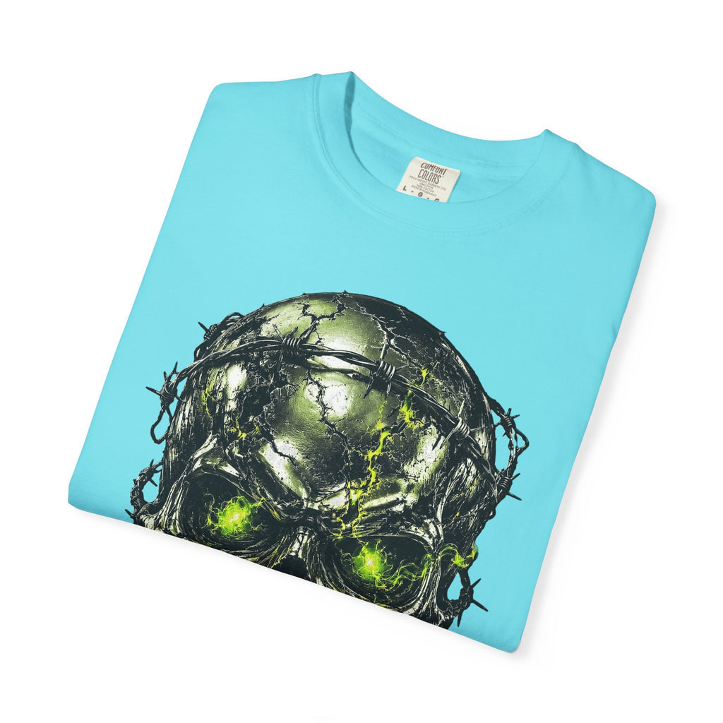 Light blue crewneck t-shirt featuring a chrome survivor skull graphic wrapped in barbed wire with glowing green eyes