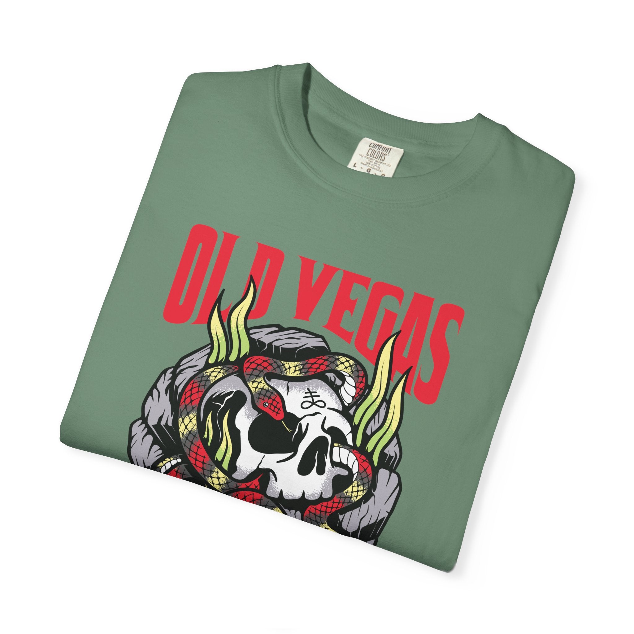 Olive green crewneck t-shirt with a bold skull graphic and red yellow snake and old vegas text in vibrant red