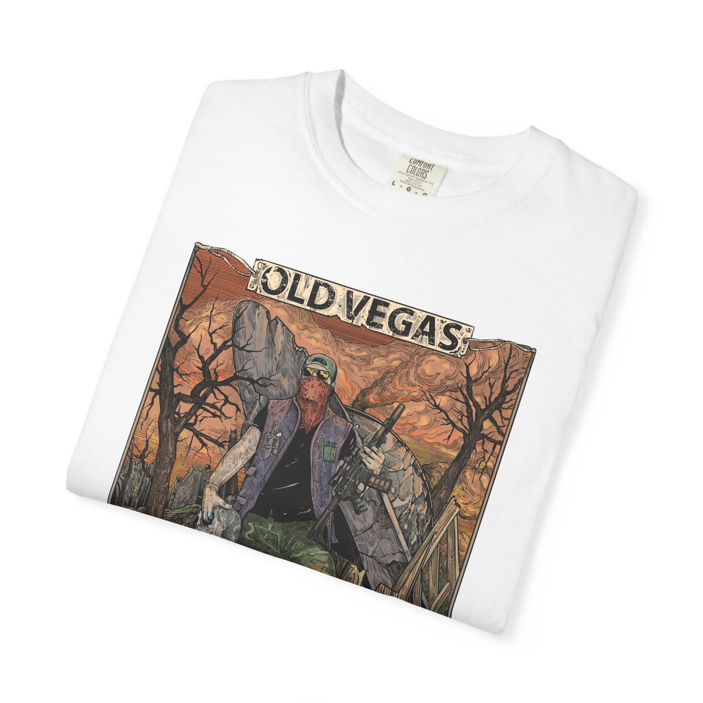 White cotton graphic tee featuring a rugged figure in an old vegas desert landscape with warm orange and brown tones