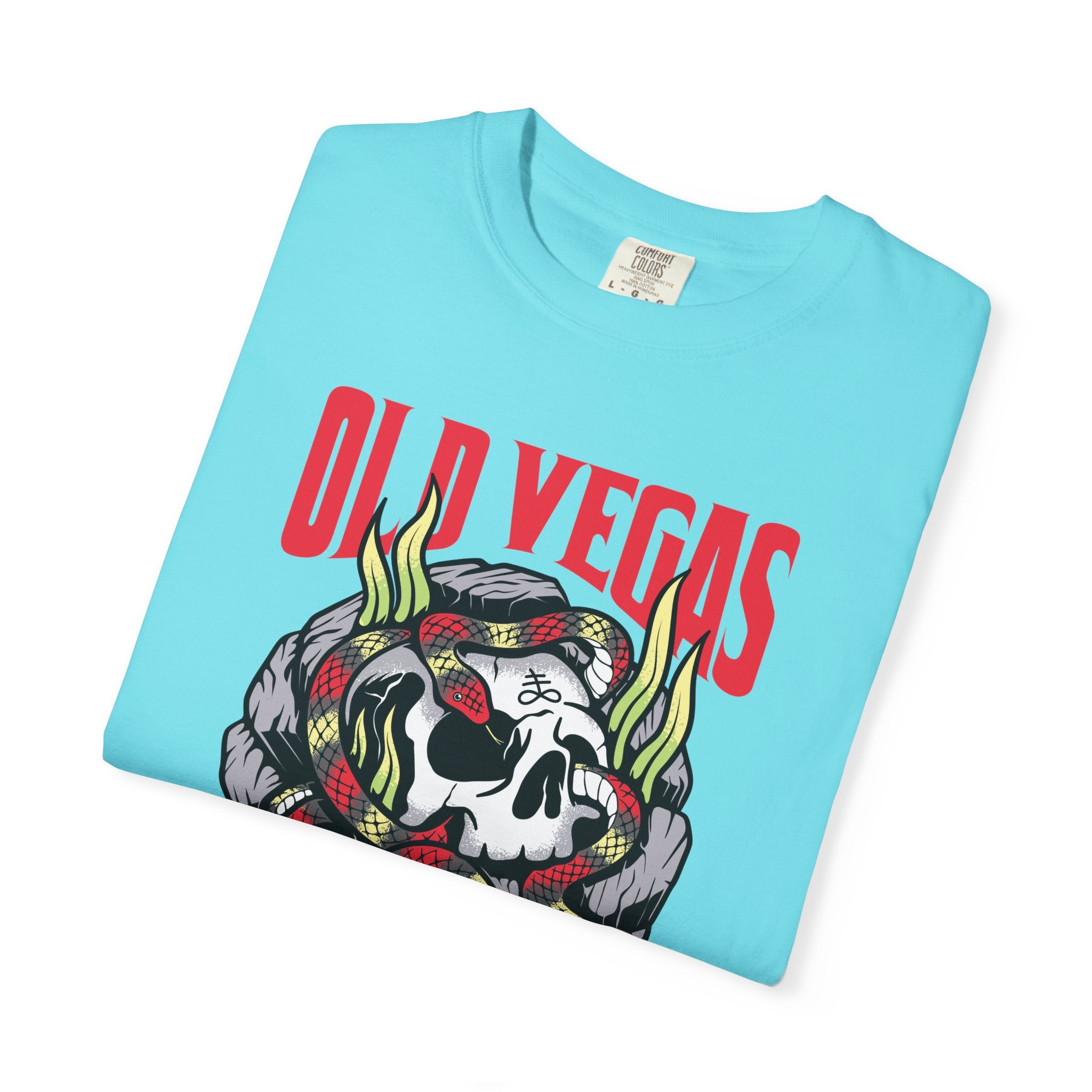 Light blue cotton skull and snake graphic tee with red and yellow snake coiled around skull and old vegas text