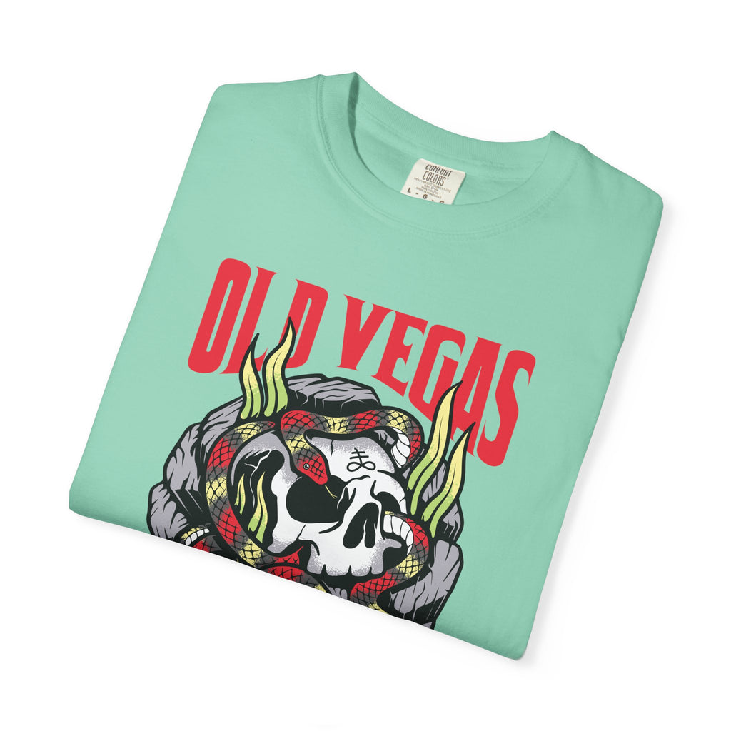 A mint green crewneck skull and snake graphic tee featuring a skull with a red and yellow snake and old vegas text