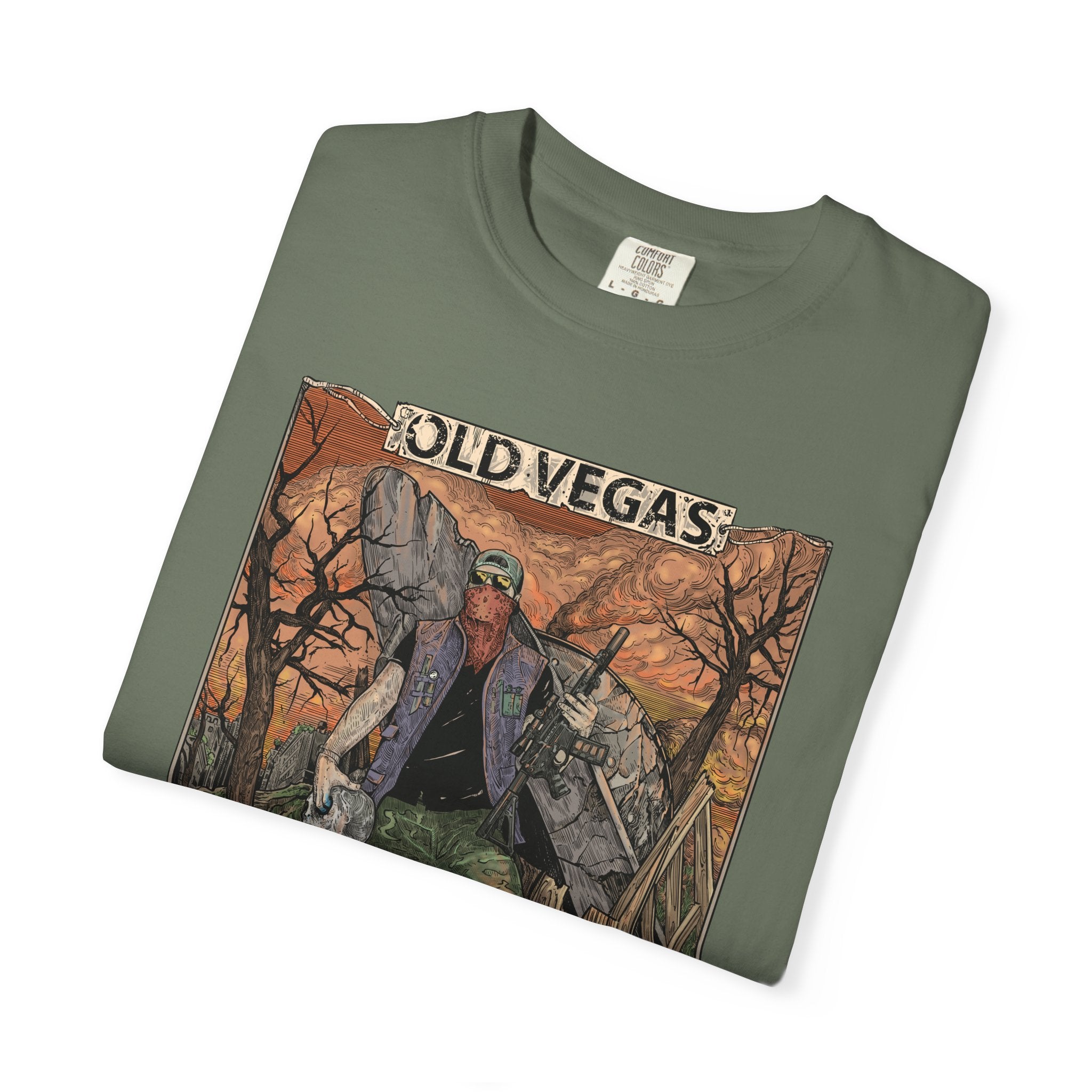 Olive green crewneck t-shirt with rugged figure graphic in old vegas desert scene warm orange and brown tones