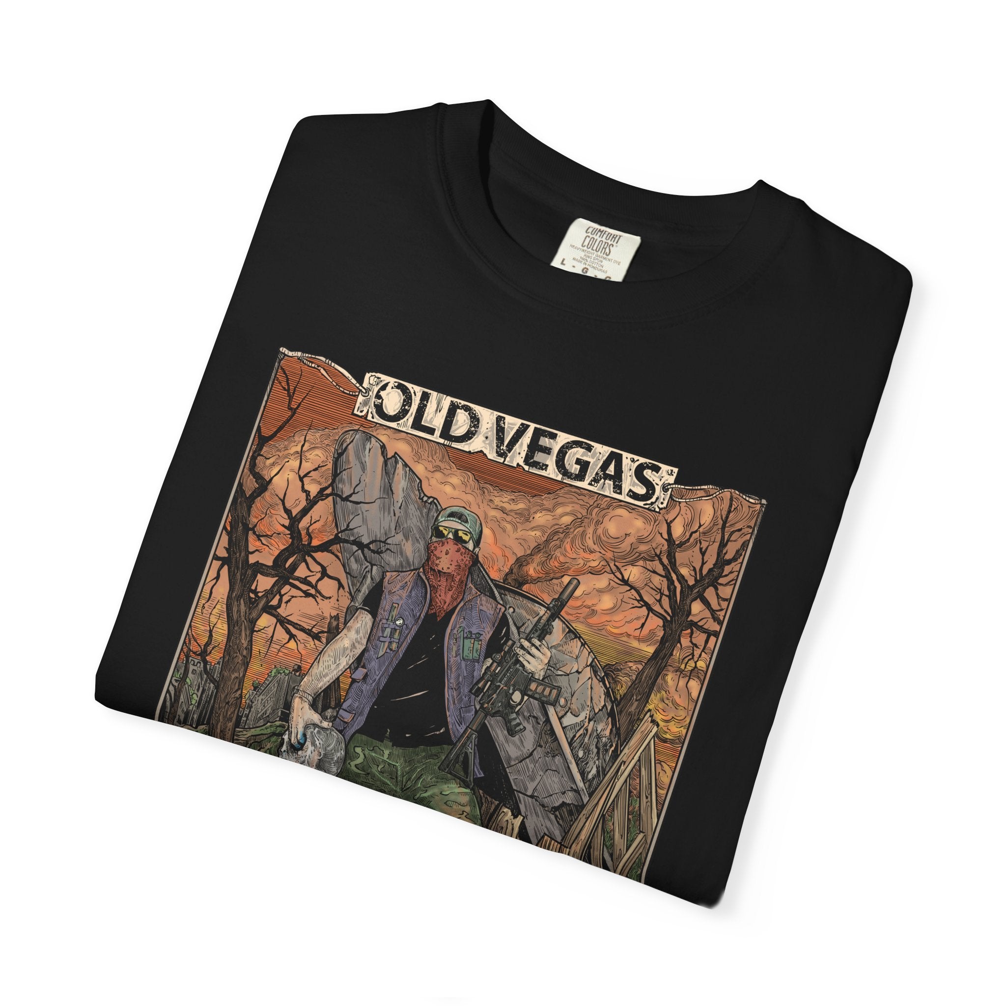 Black cotton t-shirt with a detailed graphic print of a rugged figure in an old vegas themed desert landscape